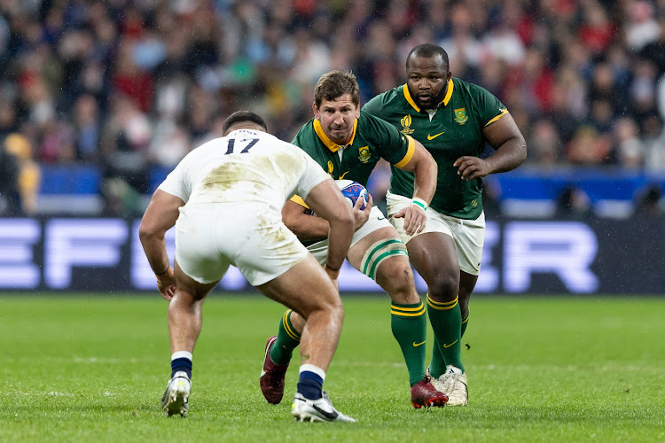 SA's Kwagga Smith on the attack against England with Ox Nche in support during the Rugby World Cup semifinal at Stade de France on October 21, 2023 in Paris