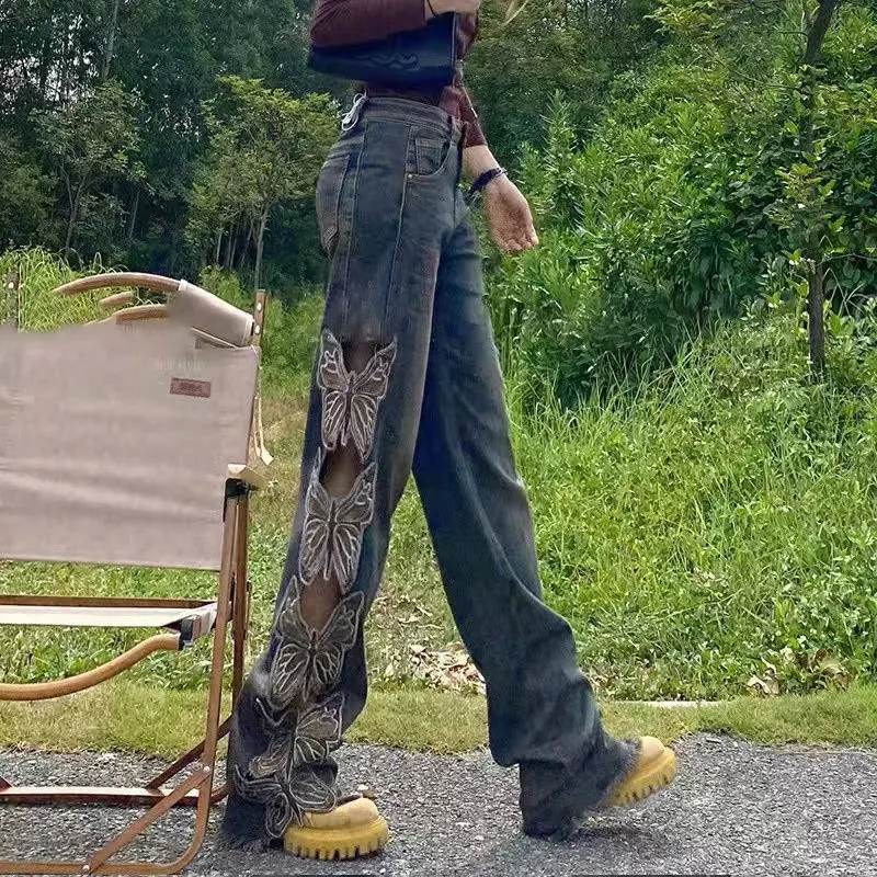 Calças femininas fashion com design de borboleta vazada e pernas largas, confortáveis e estilosas, ideais para diversas ocasiões.