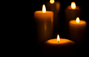 Fire candle on dark black background