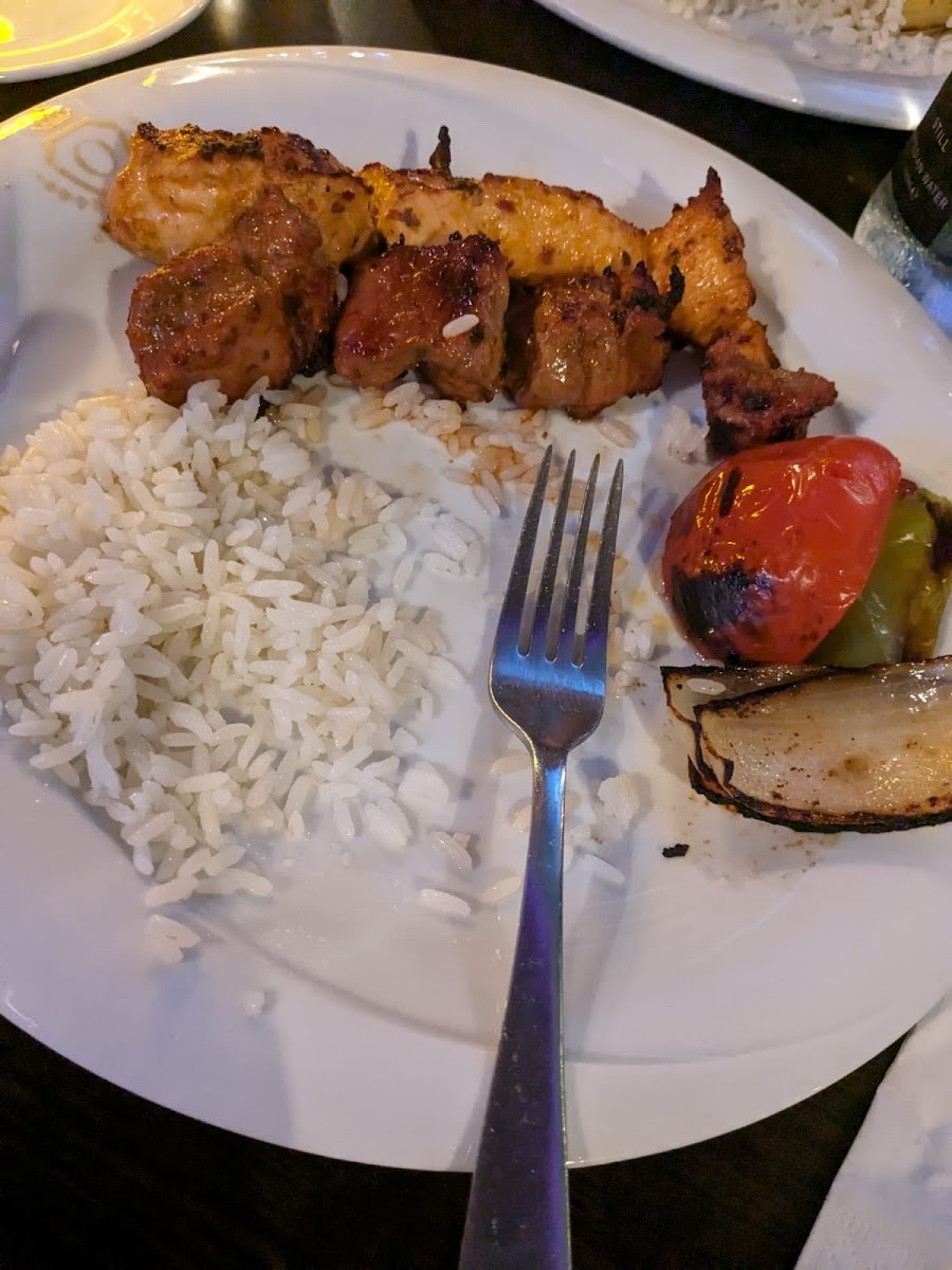 Mixed shish served with rice and salad