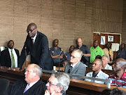 Former North West Deputy Police Commissioner William Mpembe alongside,Salmon Vermaak, Nkosana Mguye, Collin Mogale, Katlego Sekgweleya and Khazamola Makhubela appearing in the Rustenburg Magistrate's Court on charges of murder and defeating the ends of justice. 