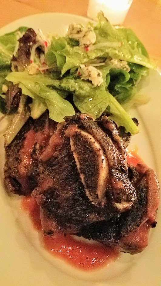 Superbite Happy Hour item of BBQ Beef Shortrib plate with baby gem lettuce salad with blue cheese and radish