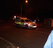 Police investigate a crime scene in Coronationville, West Rand.