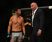 Dominick Cruz (blue gloves) with promoter Dana White (right) during UFC 249 at VyStar Veterans Memorial Arena in Jacksonville in Florida, USA, on May 9, 2020.  