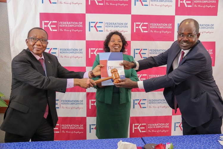 Outgoing FKE President Mark Obuya officially hands over the reins to incoming president Habil Olaka at Waajiri House, Nairobi on July 29, 2020.