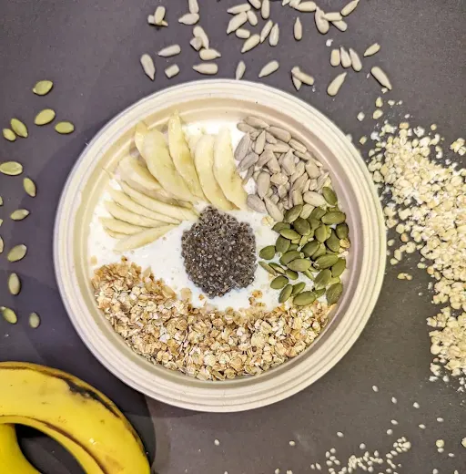 Banana Oats Mix Seeds Smoothie Bowl