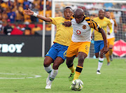 Mamelodi Sundowns' Andile Jali  fights for  ball possession with Kaizer Chiefs' Lebogang Manyama during their Absa Premiership  match at Loftus Stadium in Pretoria. 