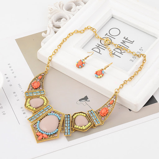 Title 5, Hollow geometric colored resin diamond clavicle...