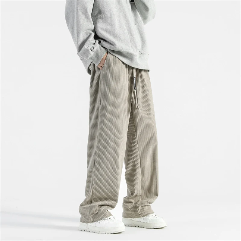 Pantalones casuales de fregona gruesos y rectos sueltos. Comodidad y estilo relajado para el día a día. Perfectos para un look informal y moderno.