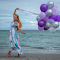 Item logo image for Girl with purple balloons