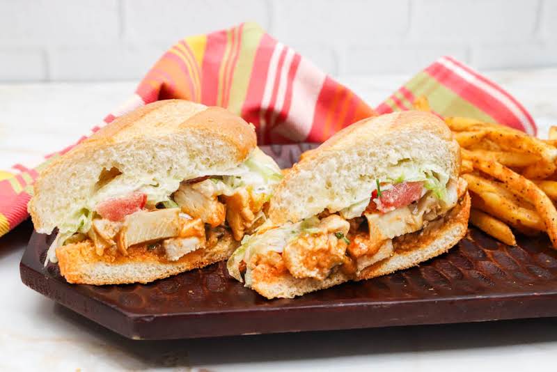 Buffalo Wing Garlic Toasted Hoagies On A Plate.