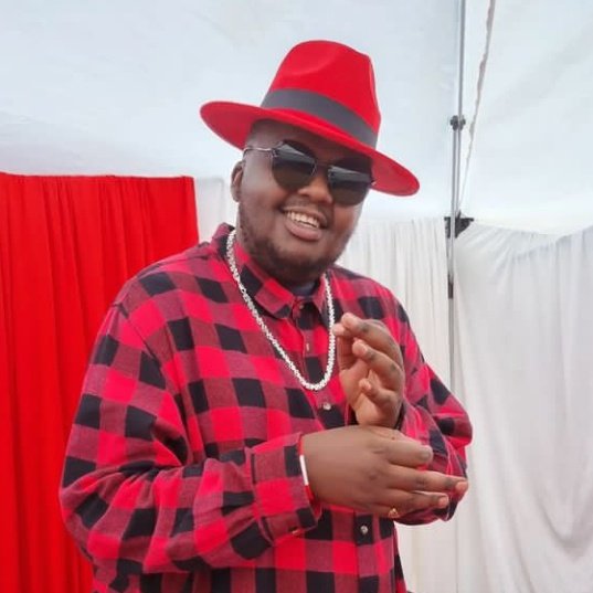 mejja okwonko wears red hat