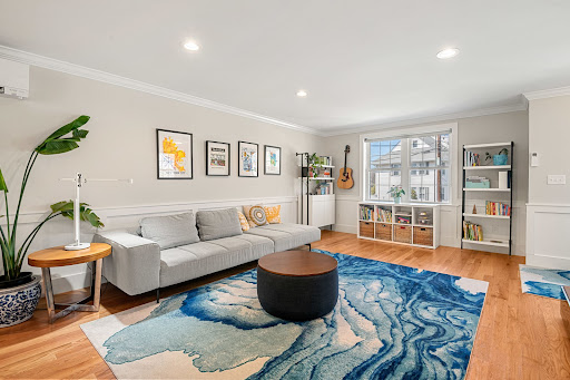 Buy this luxury apartment / penthouse in Arlington (United States) - Modern living room with grey sofa and abstract rug