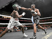 John Bopape, right, beat Wade Groth on Saturday  In this file picture, Bopape knocked out Ricky Tshabalala in June.