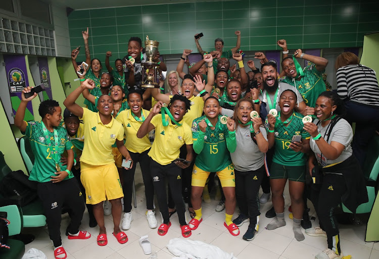 Banyana Banyana celebrate in the change room after their 2-1 Women's Africa Cup of Nations final win against Morocco in Rabat.