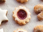 Spitzbuben (Raspberry Jam Sandwich Cookies) was pinched from <a href="http://www.saveur.com/article/Recipes/Raspberry-Jam-Sandwich-Cookies" target="_blank">www.saveur.com.</a>