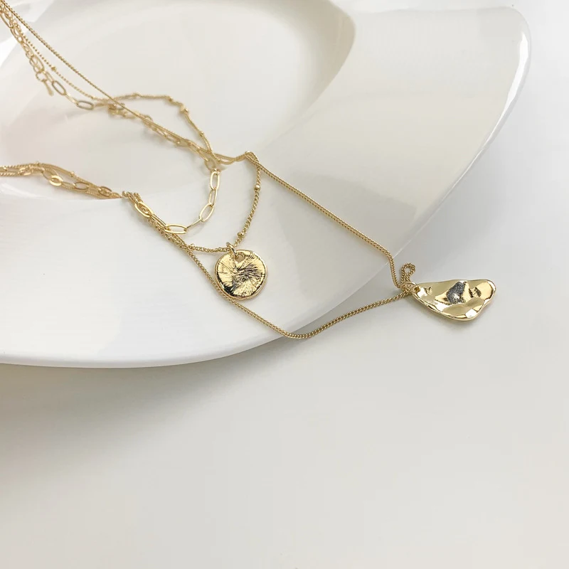 Title 3, Meerlagige clavicle ketting met driehoek hanger...