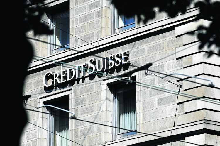 Three former Credit Suisse Group AG bankers were arrested in London on US charges that they took part in a fraud scheme involving $2bn in loans to state-owned companies in Mozambique.