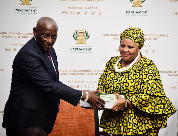 Justice Sandile Ngcobo presents the Section 89 report to The Speaker of Parliament Ms Nosiviwe Mapisa-Nqakula.