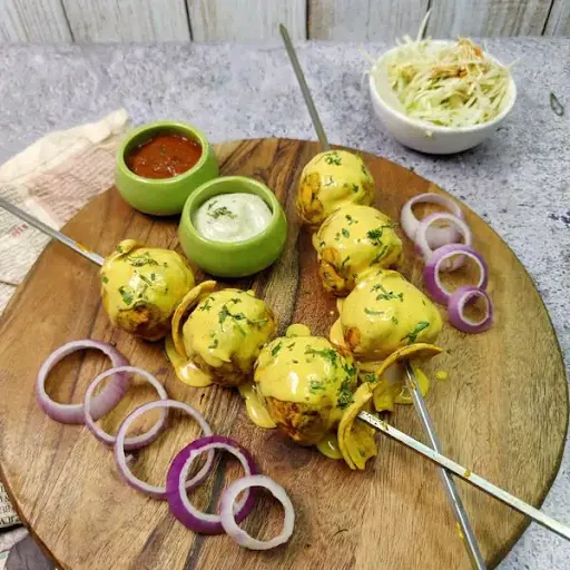 Veg Afghani Tandoori Momos - 6 Pcs