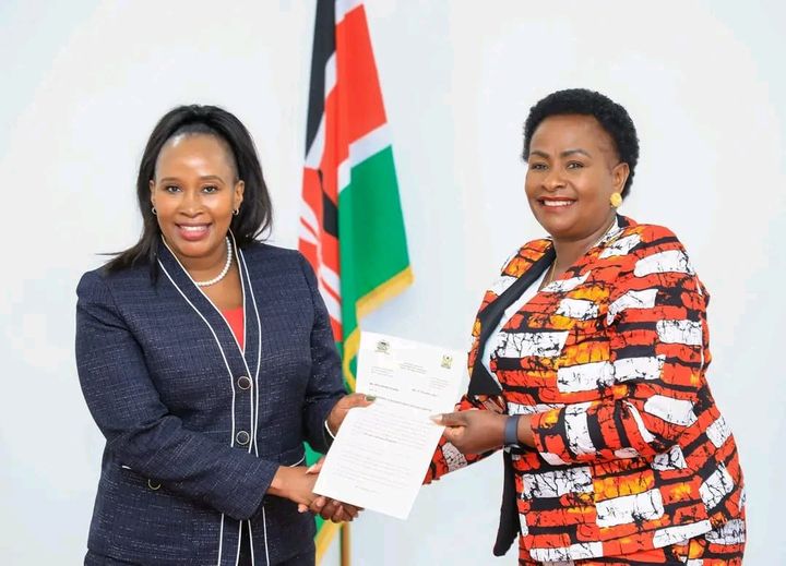 Newly appointed Machakos County Executive Committee member for Roads, Transport and Public Works, Rita Ndunge receives an appointment letter from Governor Wavinya Ndeti at the Machakos County headquarters on December 8, 2023