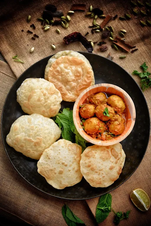 Kolkata's Classic Hing Kochuri & Double Egg Kosha