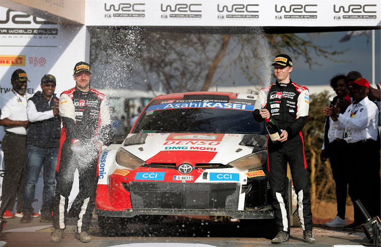 Kalle Rovanpera and his co-driver Jonne Halttunen of Toyota Gazoo team celebrate after winning the WRC Safari Rally in Naivasha. Abhi admires the driver.