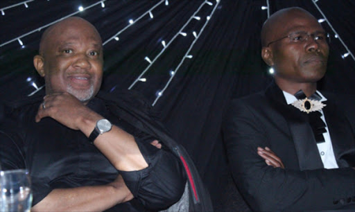 SERIOUS TALK: Former finance deputy minister Mcebisi Jonas and Nyandeni local municipality mayor Mesuli Ngqondwana during the launch of the municipality's draft Vision 2030 development plan at Dan's Country Lodge near Mthatha on Tuesday night.Picture:SIKHO NTSHOBANE