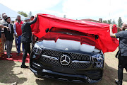 AbaThembu KIng Buyelekhaya Dalindyebo receives a special gift of a brand new SUV from the  EFF and was handed over by EFF leader Juluis Malema at the king's Nkululekweni private residence in Mthatha on Saturday