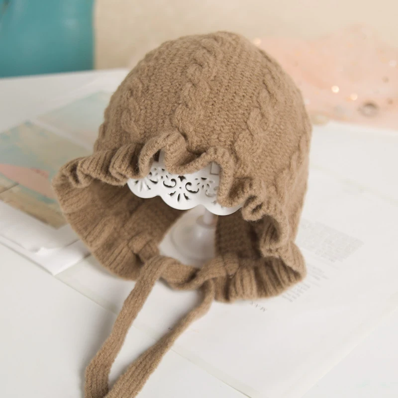 Title 2, Gorro de lana tejido con protección para las or...