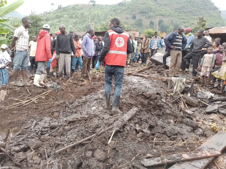 Red Cross members look for survivors after a landslide in Kasese, Uganda, September 7 2022. Picture: UGANDAN RED CROSS SOCIETY/REUTERS