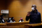 Joseas Kibi Leboga, accused of shooting and killing his girlfriend Tshepo Rakoma inside her car, briefly appeared at the Polokwane magistrate's court on Monday. 