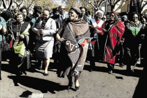 STRUGGLE GOES ON: The women who march these days are a far cry from those who marched on August 9 1956. Today's Women's Day celebrations are akin to a fashion parade rather than a statement of solidarity, says the writer. Here women march to the Union Buildings to commemorate that famous pass law protest PHOTO: Moeletsi Mabe