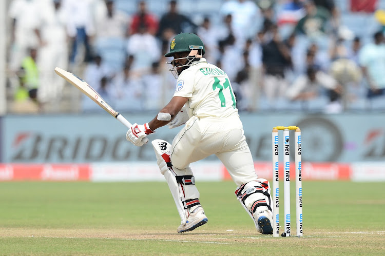 Temba Bavuma of South Africa playing a shot during day 4 of the 2nd Test match between India and South Africa at Maharashtra Cricket Association Stadium on October 13, 2019 in Pune, India.