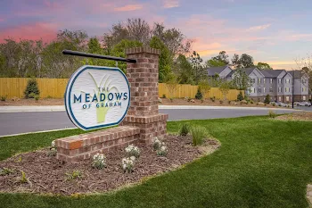 Go to Meadows of Graham Apartments website