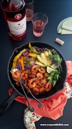 Easy One-Skillet Spicy Taco Shrimp Fajitas was pinched from <a href="https://www.easyanddelish.com/spicy-taco-shrimp-fajitas/" target="_blank" rel="noopener">www.easyanddelish.com.</a>