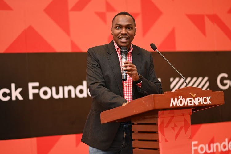 Charles Murito, Head of Government Affairs and Public Policy in Sub-Saharan Africa at Google speaking during a Google event.