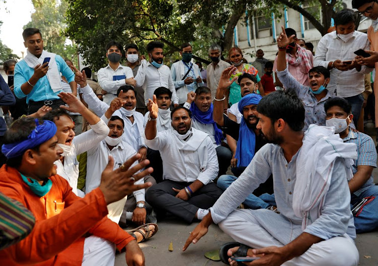 Demonstrators shout slogans during a protest inside the premises of Safdarjung Hospital in New Delhi, India, on September 29 2020, after the death of a rape victim.