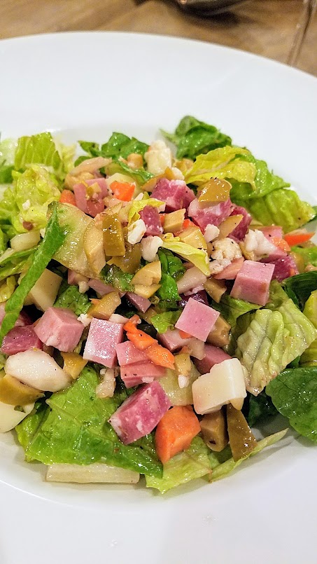 A Look at Il Solito PDX, Italian Chopped Salad is basically a sandwich masquerading as a salad with its hearty mix of romaine, finocchiona, provolone piccante, olives, giardiniera, red wine vinaigrette - every bite has salami and provolone