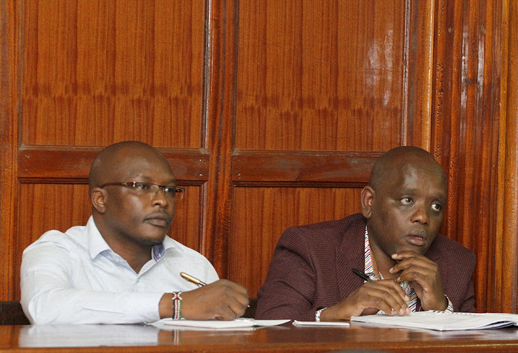 Blogger Sam Gateri and Dennis Itumbi at the Milimani Law Court in Nairobi following the hearing of DP assassination claim case hearing on January 27,2020.