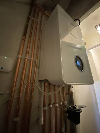 Boiler conversion to combi boiler  album cover