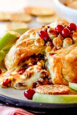 Stuffed Baked Brie in Puff Pastry was pinched from <a href="https://carlsbadcravings.com/baked-brie-in-puff-pastry/" target="_blank" rel="noopener">carlsbadcravings.com.</a>