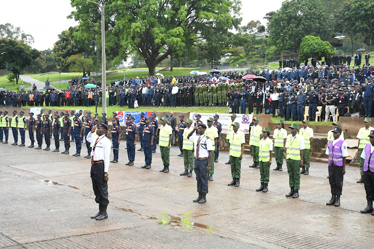 Private security guards mount a parade at Uhuru park during the mass registration exercise on March 30, 2024