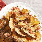 Acorn Squash with Bacon-Chive Crumbs was pinched from <a href="http://www.bhg.com/recipe/acorn-squash-with-bacon-chive-crumbs/" target="_blank">www.bhg.com.</a>