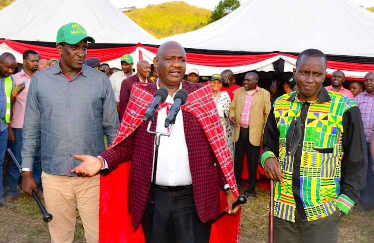 Narok Governor Samuel Tunai (centre) with former Labour CAS Patrick ole Ntutu (left) and Narok East MP Ken Aramat during inspection of Ilkiragarien health centre on Friday.