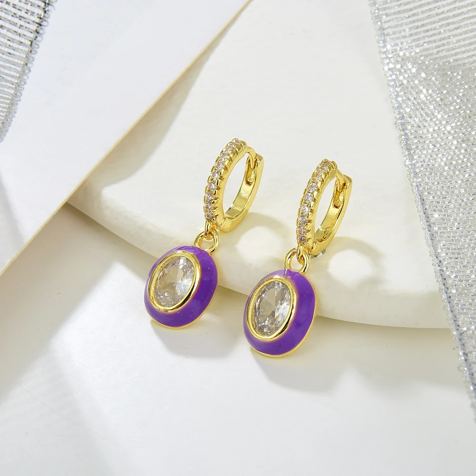 Ovale koperen micro-ingelegde zirkonia gouden oorbellen, voor een elegante en stijlvolle uitstraling.