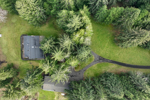 Aerial view houses in forest in this luxury house for sale in Seaside ($1,195,000 - 332 m²)