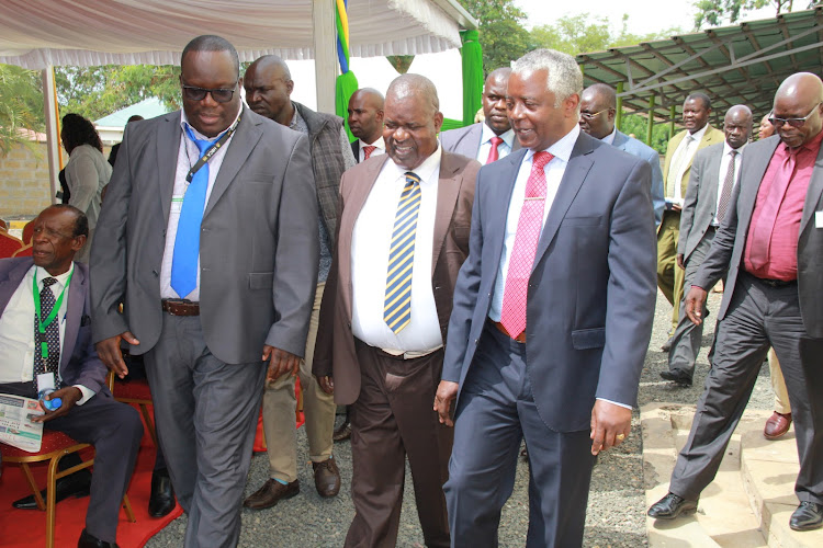 Homa Bay assembly majority whip Dan Were, Governor Cyprian Awiti and his deputy Hamilton Orata at the assembly premises during the state of the county address in Homa Bay town on April 12, 2022