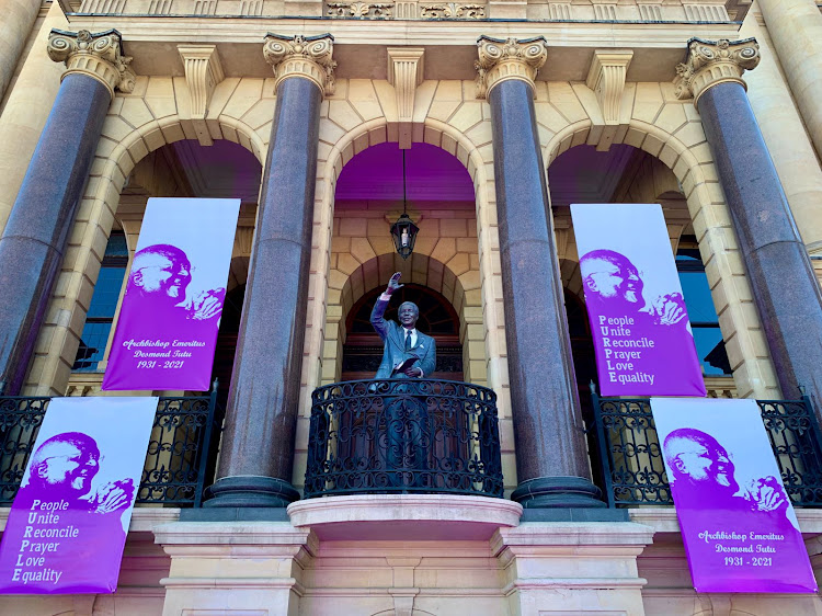 Purple flags adorn the Cape Town City Hall in remembrance of Archbishop Emeritus Desmond Tutu.