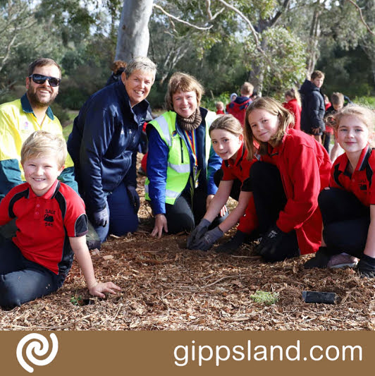 Sale Primary School students Patrick Davison, Paige Bettess, Ruby Hopkins and Mckinley Luttrell joined Wellington Shire Councils Land and Natural Resources Coordinator Justin Gorwell, Open Space Officer Tracey Parker and Sustainability Education Officer Sharon Ray to dig in Councils 100,000th plant in six years - a native wattle tree, common to the area